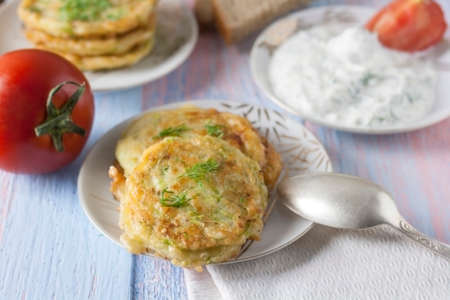 Pancakes from zucchini. Vegetarian vegetable patties or pancakes. Healthy food.の写真素材