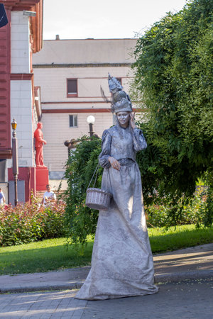 Ukraine, Odessa, summer 2021. Young girls made up as a sculpture. Living statuesのeditorial素材