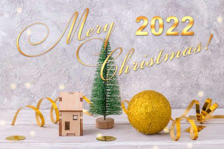 Happy 2022 concept Christmas card. Christmas decor on a light background