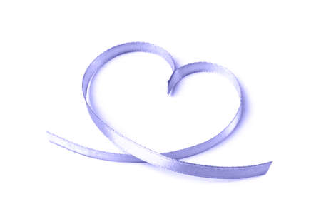 Heart made of satin ribbon of color of the year 2022 veri peri on a white background. Valentine's...
