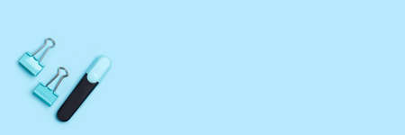 office supplies on a blue pastel background. Banner with copy space