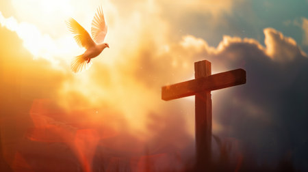 Dove of peace flying over a cross at sunriseの素材