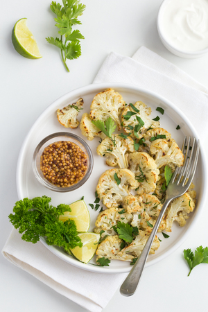 roasted cauliflower, white background, top viewの写真素材