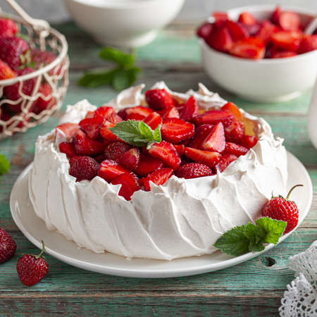 Pavlova cake with fresh strawberry, seective focus, square imageの写真素材