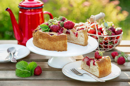 summer strawberry cake wooden table, outdoor, selective focus