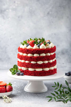 festive Red Velvet cake on white cake stand, selective focus,