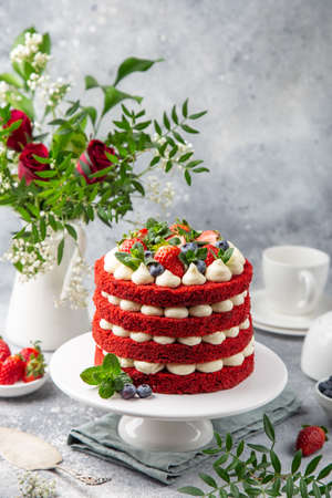 festive Red Velvet cake on white cake stand, selective focus,の写真素材