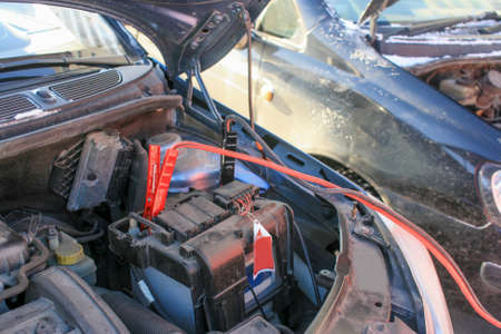 wires and clam terminals on car batteryの写真素材