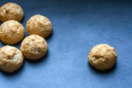 Fresh homemade cookies on a dark blue background