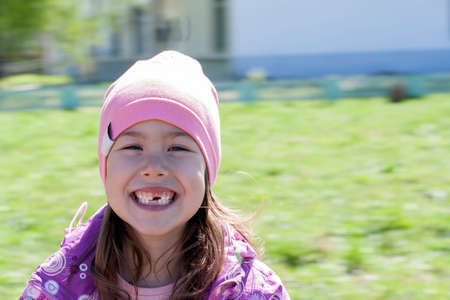 Happy child of preschool age on carouselの写真素材