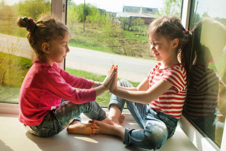 Children's games with hands. Friends since childhood conceptの写真素材