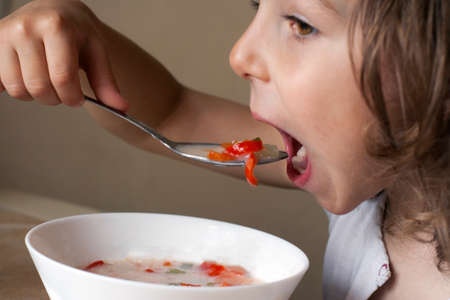 Poor child's appetite. Self-service skills. Useful food for children.の写真素材