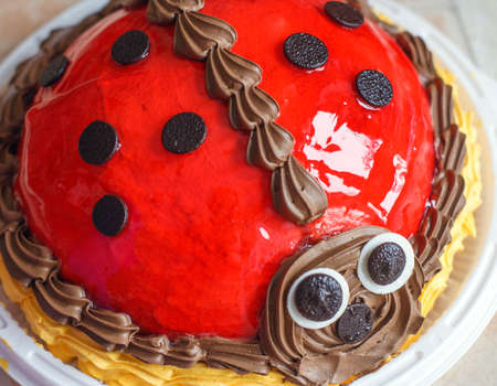 Delicious baby cake in the shape of ladybugの写真素材