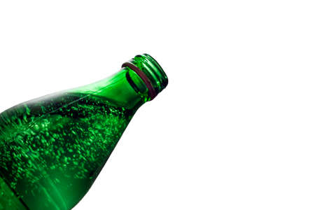 Green bottle with mineral water isolated on white backgroundの写真素材