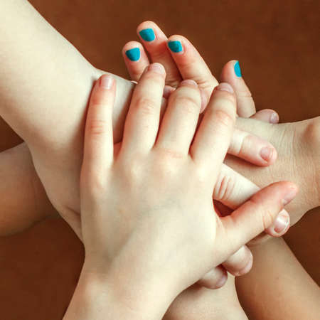 Pyramid from the hands of children, meaning unity and strong friendship