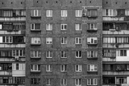 Black and white windows of a multi-storey buildingの写真素材