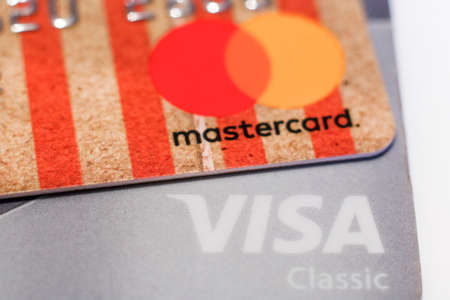 04.16.2018 Magnitogorsk, Russia: credit cards Master card and visa with microchip close-upのeditorial素材