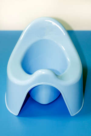 Blue baby pot isolated on the floorの写真素材