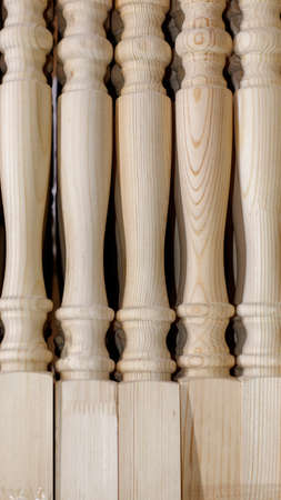 Wooden carved balusters without painting with pine textureの写真素材