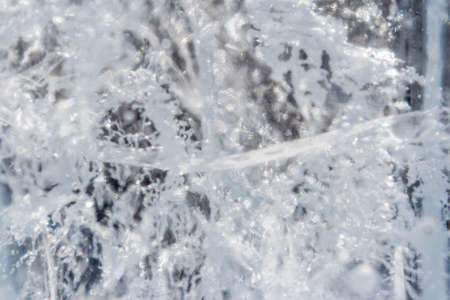 Beautiful cracks in the ice. Background for desktopの写真素材