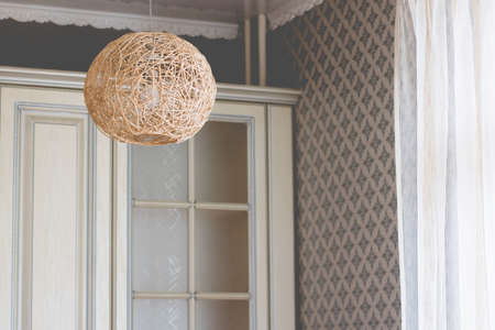 Details of a classic interior in provence style. The kitchen is in warm, gentle light colors.