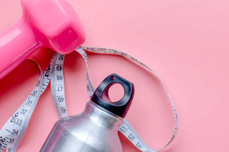 Banner template set for home fitness. Water bottle, measuring tape, pink dumbbell. Women's sportの写真素材