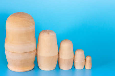 Wooden birch blanks of Russian nesting dolls for coloring. Folk art. Children's craftsの写真素材