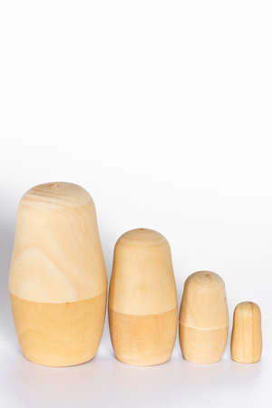 Wooden birch blanks of Russian nesting dolls for coloring. Folk art. Children's craftsの写真素材
