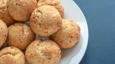 Fresh homemade cakes. Lush curd buns on a white plateの写真素材