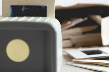 Vintage photographs with memories and a diascope.の写真素材