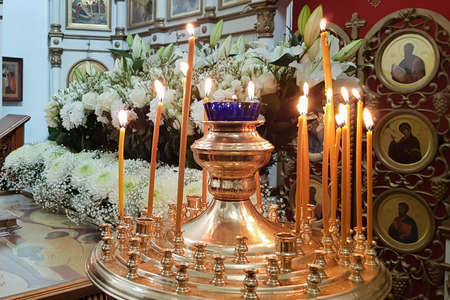 Moscow, Russia - April 27, 2019: Conducting a ceremony in the Church on the occasion of the celebration of Easter. The lighting of candles.のeditorial素材