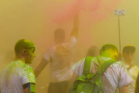 Moscow, Russia - June 2, 2019: Colorful race near sports complex Luzhniki. Crowds of people throw colour powder during the annual event.のeditorial素材