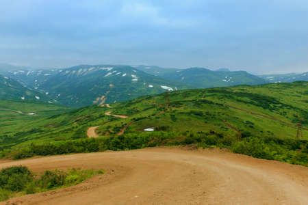 Majestic nature in Russia. Mountain peaks and plains. Summer. Tourism, mountaineering, travel rest. Serpentine.の写真素材