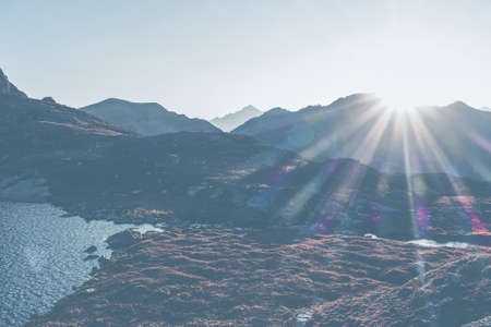 Scenic landscape outdoors. Sunset rays of the sun. Haze, mist, fog. organic, fresh, no people.の写真素材