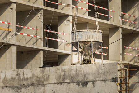 Equipment with concrete. Construction of a new residential complex for young families. Concept...
