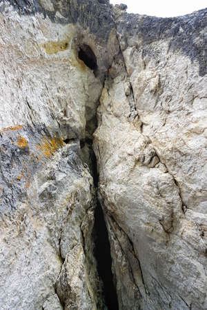 A grotto in the rock. Concept archaeology, geology, research and excavation.の写真素材