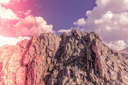 Picturesque mountain scenery with cumulus clouds. wildlife. Hiking. daytime. dawn, daybreak, sunriseの写真素材