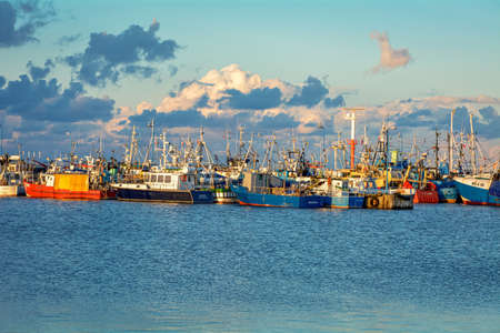 Fishing boats in port WÅadysÅawowo - Poland, colorful boats, golden hourの写真素材