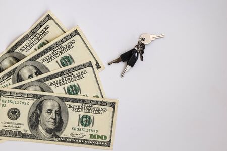 Business under the key, us dollars and keys , copy space Money opens many doors, cash savings for...