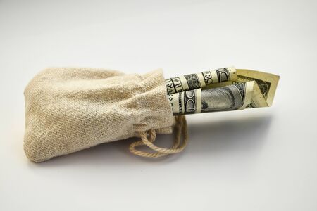 Money bag with dollars isolated on white background, business finance. save money for investment concept money bag, copy spaceの写真素材