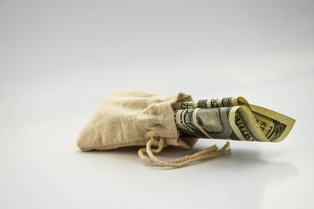 Money bag with dollars isolated on white background, business finance. save money for investment concept money bag, copy spaceの写真素材