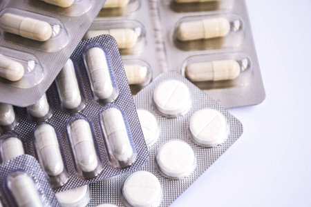 Prescription Pills Packages Pills in blister packs on white background, Drugs for the treatment of diseaseの写真素材