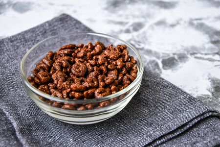 A plate with a quick breakfast of chocolate flakes in the shape of letters. Back to school. September 1 concept. Top view, flat layの写真素材