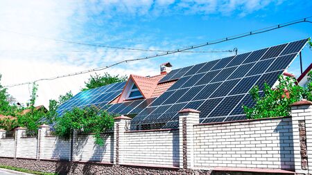 solar panels, Close up shot of a solar panel array with blue sky, Solar panels on a roof for...