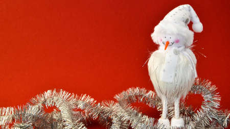 Festive cheerful snowman with Christmas shiny background. Good New Year spirit. New Year, Christmas concept. Copy space. Greeting cardの写真素材