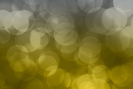 Demonstrating trendy colors 2021 - Gray and Yellow. Color of the year 2021. Defocused light. Bokeh background. Copy space. Illuminating, Ultimate grayの写真素材