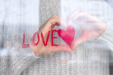 Red heart LOVE on a window, stay home, quarantine leisure, let's all be well, Valentines day, Love, Romanceの写真素材