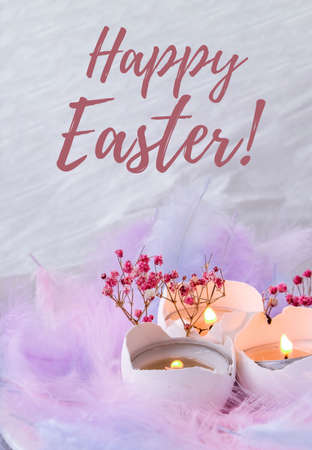 HAPPY EASTER lettering greeting card text. DIY. Do it yourself. Composition of White egg shell with...