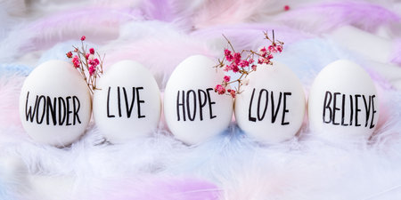 Easter eggs Composition. Easter message, Words drawn with pen. High Angle View Of Shells On Table....