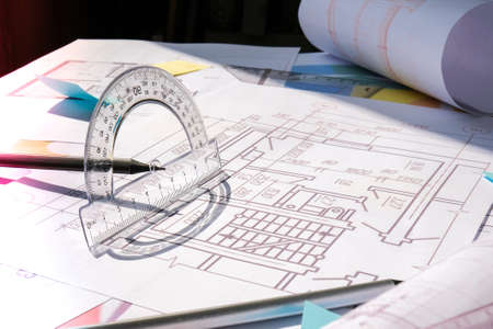 A pencil with a protractor. Architectural Project drawings with tools. Architects workplace. Engineering Interior designer's working table. Workspaceの写真素材
